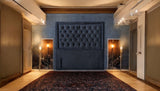 KIM Chesterfield headboard front view in black upholstery with deep tufted buttons