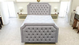 TOTO ottoman bed front profile view showing fabric upholstery and sleek bedroom furniture silhouette