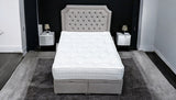 TOTO ottoman bed with foot opening storage compartment revealed, showing spacious hidden storage space inside fabric upholstered bed frame
