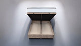RANA brown ottoman bed with foot-end storage compartment open, revealing spacious interior storage