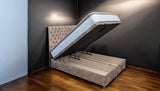 RANA brown upholstered ottoman bed side profile view showing sleek design and proportions