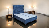 CALORIS upholstered fabric ottoman bed with end opening storage - front angle view