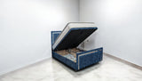 CALORIS ottoman storage bed closed position showing elegant upholstered fabric finish